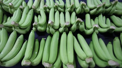 Wall Mural - Bunches of fresh green thailand banana