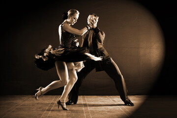 Wall Mural - Dancers in ballroom isolated on black background