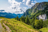 Fototapeta Kuchnia - Alpine huts, meadows, lakes and woods of the Friulian mountains