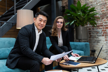 Wall Mural - Business business meeting, two businessmen Asian man and woman, business discussion, international business partners hold a meeting