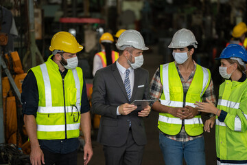 Team technician maintance standing talking manual worker. inspector man in factory industry safety service workshop solution. teamwork engineer expertise innovate.