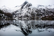 © Josu Torrealday/ADDICTIVE STOCK - Magnificent scenery of sea and mountains under gray cloudy sky in winter in Norway
