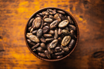 Roasted cocoa beans in bowl