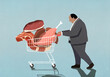 © fStop - Overweight businessman with shopping cart full of meat