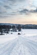 Winter landscape, road in forest after snowfall, north nature