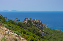 Beautiful Seascape With Of The Medieval Fortress Monolithos On The Mountain Top (Rhodes, Greece)