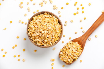 Dried chickpeas in bowl isolated on white background.