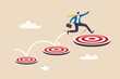 Aspiration and motivation to achieve bigger business target, advancement in career or business growth concept, smart businessman jumping on bigger and higher archery bull's eye target.
