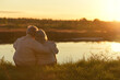 © aletia2011 - senior couple sitting on grass