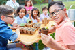 © Robert Kneschke - Group of children with seedlings learn botany