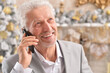 © aletia2011 - Portrait of senior businessman talking on phone