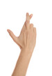 © New Africa - Woman with crossed fingers on white background, closeup. Superstition concept