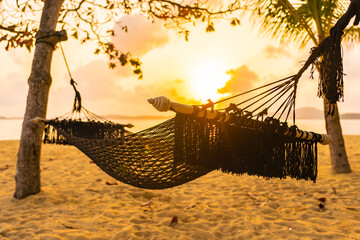 Sticker - Empty hammock swing around beach sea ocean at sunset or sunrise time