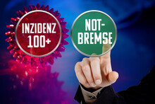 Buttons With The German Words Inzidenz 100  (incidence 100 ) And Notbremse (emergency Brake)