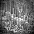Unique natural basalt rock pillars columns  in Iceland. Geological wonder hexagonal volcanic formations in Vik beach.