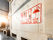 © xartproduction - Bright red special marking symbols on wooden boxes with goods inside, prescribing careful handling of the cargo