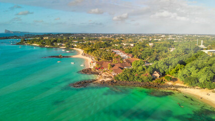 Wall Mural - Aerial view of Grand Baie coastline from drone, Mauritius