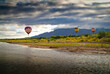 © Tandem Stock - balloons soaring about Sandia Mountains and Rio Grande River during Albuquerque Balloon Fiesta