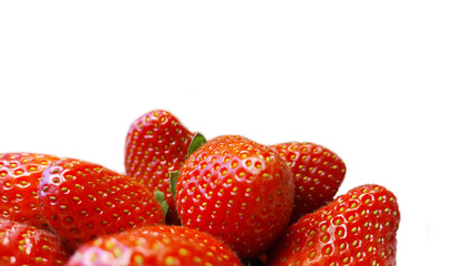 Ripe red large strawberries on a white background