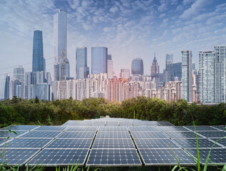 Wall Mural - solar panel plant with urban landscape landmarks,ecological energy renewable concept.