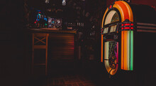 Retro Jukebox On Dark Background In Bar