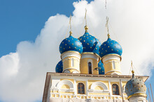 Moscow, Russia,Kolomenskoye Park.  Our Lady Of Kazan Church. Bright Sunny Day. Blue Sky With Clouds