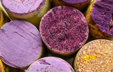 Makro closeup of pile isolated wine corks with red tartrate (focus on center)