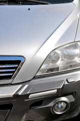 Detail of car headlights lamp, gray modern car front lamp