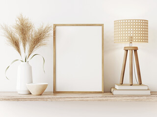 Poster - Small vertical wooden frame mockup in japandi style room interior with caned lamp and dried Pampas grass on empty white wall background. A4, A3 format. 3d rendering, illustration