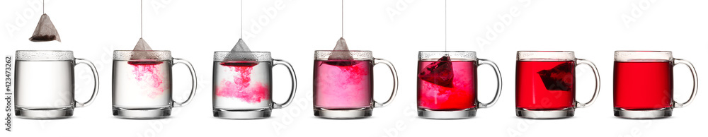 Process of making tea in glass cup on white background - obrazy, fototapety, plakaty 