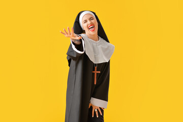 Wall Mural - Naughty nun on color background