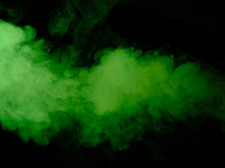 Wall Mural - Green smoke texture on black background