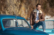 © zokov_111 - man driving a retro car