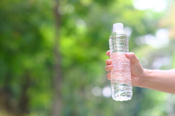 Poster - hand holding water bottle