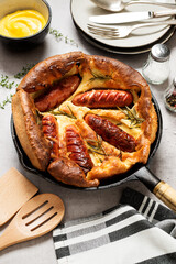 Wall Mural - Toad in the hole, Sausage Toad, traditional English dish of sausages in Yorkshire pudding batter. 