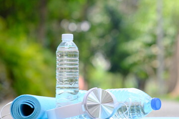 Canvas Print - bottle of water in the park