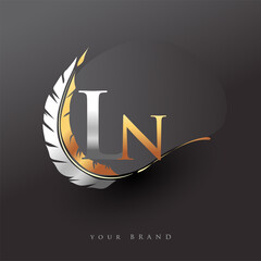 Initial letter LN logo with Feather Gold And Silver Color, Simple and Clean Design For Company Name. Vector Logo for Business and Company.