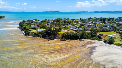 Wall Mural - Quiet suburb on a shore of the sunny harbour. Auckland, New Zealand.