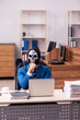 © Elnur - Devil businessman working in the office