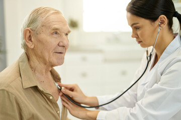 Wall Mural - Qualified medic examining senior man lungs with stethoscope