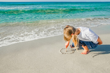 happy child by the sea in the open air