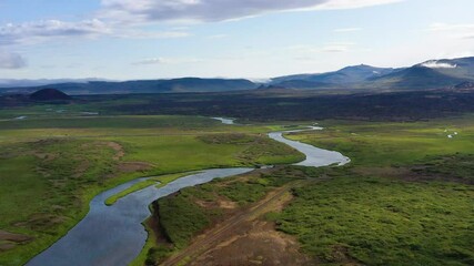 Wall Mural - iceland. aerial view on mountain, field and river. landscape in iceland at the day time. view from d