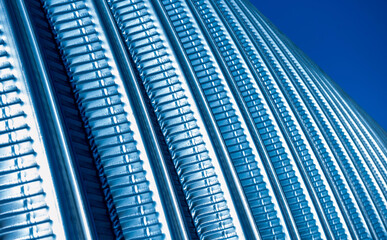 The surface of a industrial metal roof. Abstract background