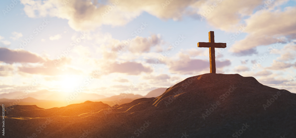 Cross on mountain peak at sunset christian religion - obrazy, fototapety, plakaty 