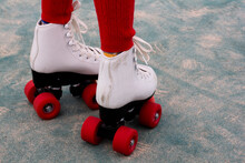A Child's Red Wheels Roller Skate