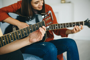 Wall Mural - Learning to play the guitar