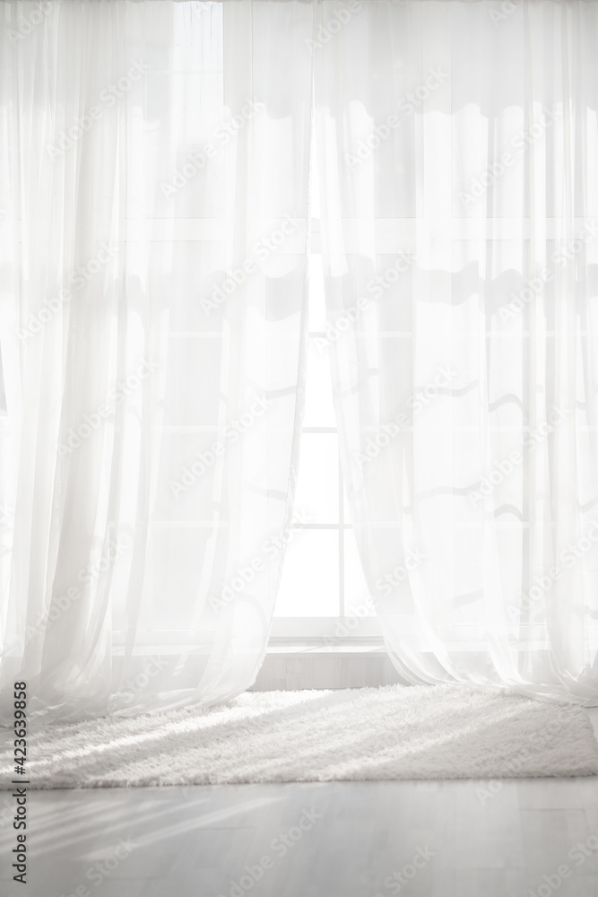 Backlit window with white curtains in empty room - obrazy, fototapety, plakaty 