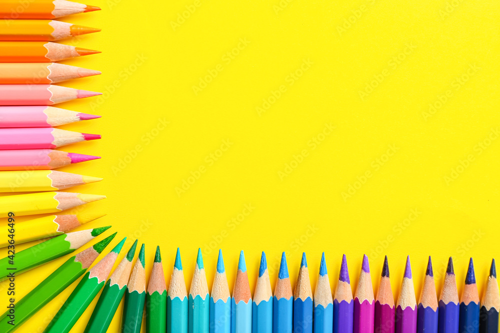 Composition with colorful pencils on color background