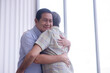 © lmanju - asian grandpa hug with his friend