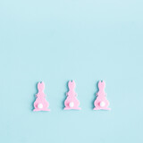 Fototapeta Lawenda - Easter composition. Rabbits on pastel blue background. Easter minimal concept. Flat lay, top view